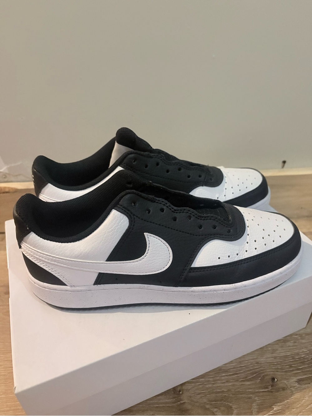 Nike Black and White Low-Cut Sneakers with Swoosh